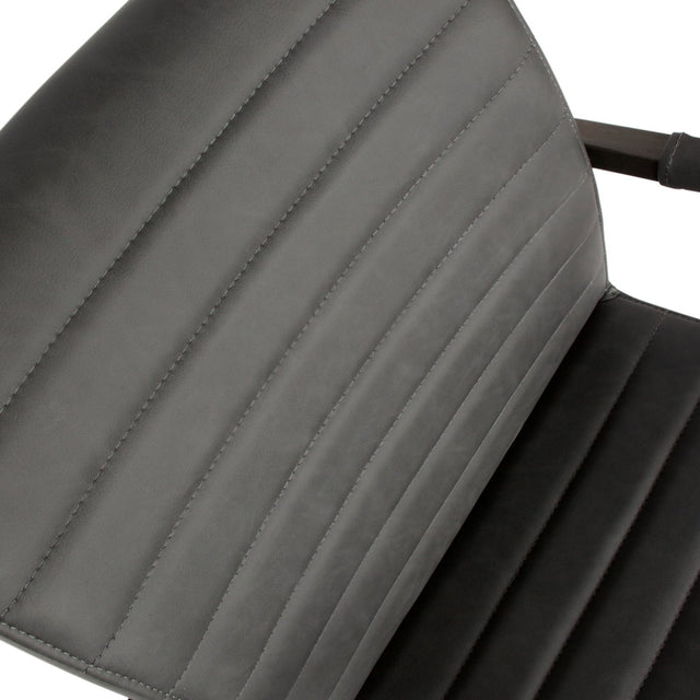 Bas Eetkamerstoel Pu Antraciet van WOOOD – Luxe comfort op maat van PureWonen. Vraag naar de beste prijs.